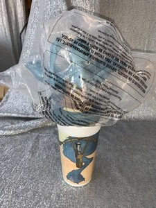 lot 76 image: Collectors Vintage Star Wars cup with top- see pics