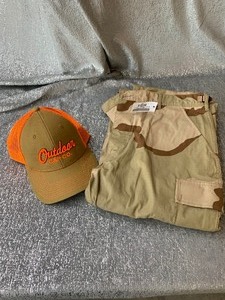 lot 68 image: Pair of cargo pants and cap - see pics