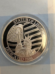 lot 184 image: 1 ounce fine silver dollar
