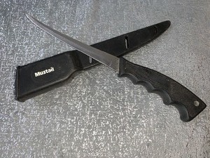 lot 134 image: Mustad filet knife with sheath - see pics