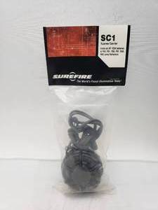 lot 373 image: Surefire Spares Carrier w Lanyard   Holds 6 Batteries and Short Style Lamp