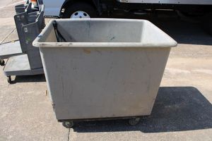lot 9 image: Rolling Plastic dumpster Bin