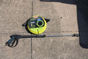 lot 7 image: Ryobi Pressure Washer Hose unopened and Pressure washer gun
