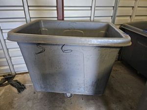 lot 54 image: Rolling Plastic dumpster Bin