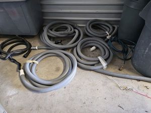 lot 58 image: Vacuum Hoses with Plastic Trash Bin