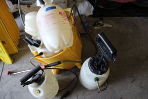 lot 105 image: Handheld Sprayer tanks in mop bucket (needs another wheel)