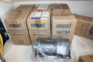 lot 132 image: (7) unopened Compact side-by-side tissue dispensers in Translucent Smoke
