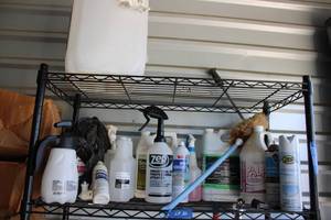 lot 32 image: Cleaning supplies (on one shelf)