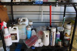 lot 33 image: Cleaning supplies (on one shelf)