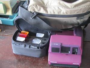 lot 48 image: Polaroid Impulse camera with FILTER KIT  RARE   and a carry bag  $$$$
