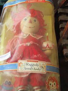 lot 3 image: Original Raggedy Ann and Andy porcelain keepsake doll in original box . 16 tall