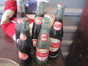 lot 62 image: DR. Pepper bottles qty 5 (2 OLDER) , 1 opened  FOR DISPLAY ONLY