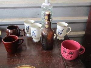 lot 66 image: coffee cups- brown glass Bottle - clear glass jar