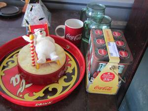 lot 88 image: coca cola tin can- round metal coca cola tray- coca cola polar bear alarm clock