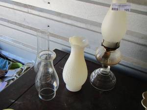lot 105 image: various glass globes and one oil lamp with globe