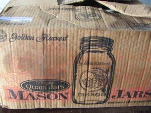 lot 165 image: box of mason jars with lids