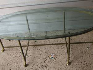 lot 218 image: Brass base oval glass top table - Hoof feet 16x52x26