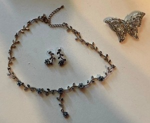 lot 252 image: SILVER NECKLACE W BLUE STONE FLOWERS  HAS MATCHING EARRINGS,  &  BUTTERFLY BROACH