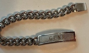 lot 254 image: STERLING - I D BRACELET -STERLING SILVER SHIELD  W STAINLESS CHAIN SPEIGEL USA  - ENGRAVED GENE ON FRONT & LUV JAN ON BACKF