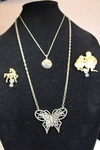 lot 9 image: Signed Casual Corner, ART, 5X, and Hallmark Broochpins and necklaces. See descriptions.