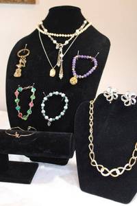 lot 20 image: Faux pearl necklaces, stretch bead bracelets, Guitar with key keychain and more. See descriptions.