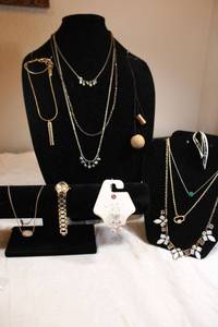 lot 23 image: Signed Swarovski with green slip bead, Anne Klein watch, Sarah Coventry Paisley shaped broochpin and more, See descriptions.