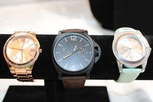 lot 26 image: Watches rose gold, black large face and mint green band with crystal halo watch. See descriptions.