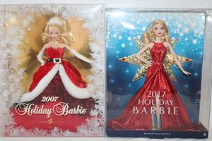 lot 148 image: Barbie Dolls unopened in Packages