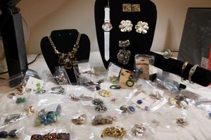 lot 126 image: Decent jewelry that needs repair. May need O-ring, glue, missing stones, etc. Generous quantity.