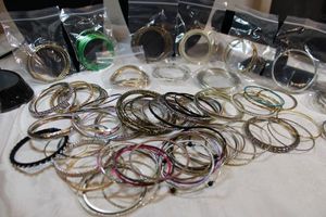 lot 112 image: Metal bangle selection. Generous quantity.