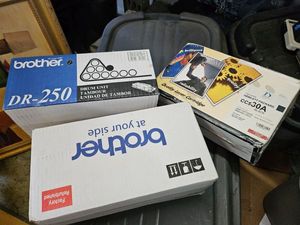 lot 162 image: Printer cartridges - Brother DR-250, HP CC5 30A Black, and Brother RADS1700W