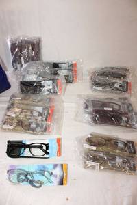 lot 183 image: Reading glasses still in packages. See photos for sizes.