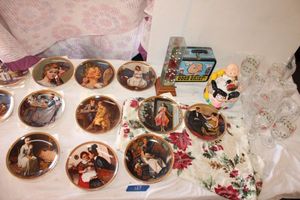 lot 187 image: Norman Rockwell Plate collection, PEANUTS cookie jar and lunch pail, Christmas goblets and tablecloth.