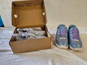 lot 197 image: Kids Skechers size 12 (look new), and Skechers size 11.5 (gently used)