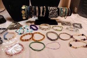 lot 89 image: (40) stretch bracelets. Varying styles, ages, materials, conditions.