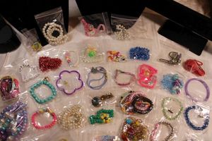 lot 81 image: (35) Childs jewelry selection. Assortment of necklaces, bracelets, earrings, rings plus