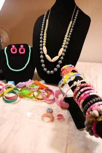 lot 83 image: Rubber jewelry selection. Necklaces, bracelets, ring, earrings, imprinted bands plus.