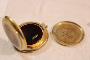 lot 73 image: Armitron 1977 vintage Swiss LED solid state quartz pocket watch. Gold plated case. Model Depose Mollory 10L 129 RW 25  93455. Inscribed Dale Lee Sanders 12-25-1977 inside Stem needs attention. Digital display was all the rage in the 70s.