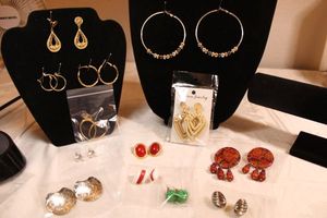 lot 61 image: (12) Matched poststud earrings. Varying styles, ages, materials.