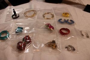 lot 64 image: (12) Matched poststud earrings. Varying styles, ages, materials.