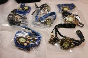 lot 42 image: (8) Blue and black multi leather band quartz watches with snap closures (8 count)