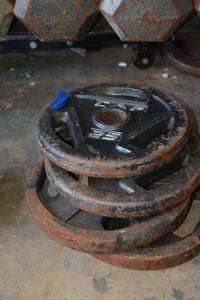lot 238 image: 25 LB Barbell weights - 4 total