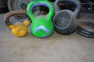 lot 230 image: Kettlebells - (2) 15 LB and (1) 10 LB