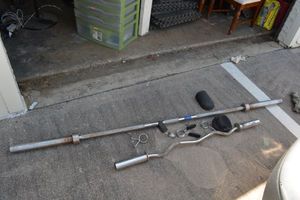 lot 244 image: Bars for weight lifting and weight stoppers