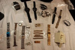 lot 100 image: Watches and watch fittings, bands.
