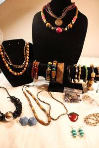 lot 94 image: Large selection of wood jewelry. Generous selection