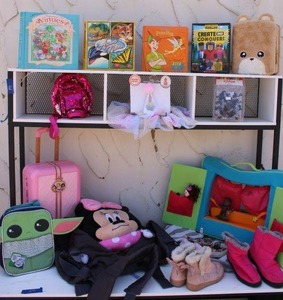 lot 271 image: Girls toy lot Books, Bear case backpack, Baby birthday set 12-18 M, Baby harness carrier, and more