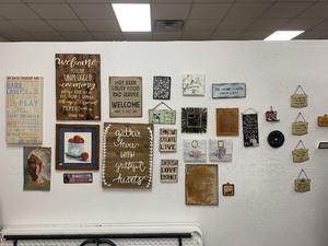 lot 39 image: Large assortment of wood and metal all kinds of sizes wall decor There are some great finds here
