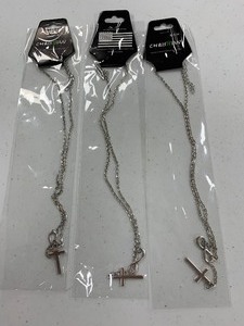lot 82 image: Christian designer necklaces ONE MONEY