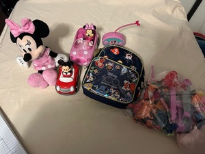 lot 103 image: Disney toy lot with a remote control car